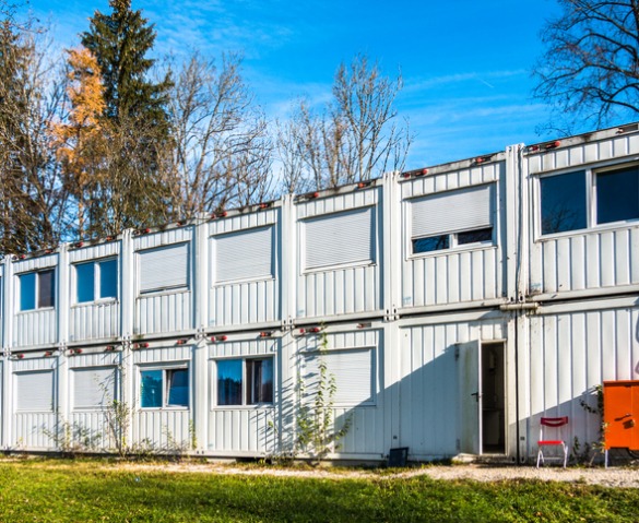 Durable Steel Shipping Containers Stacked One on Top of the Other