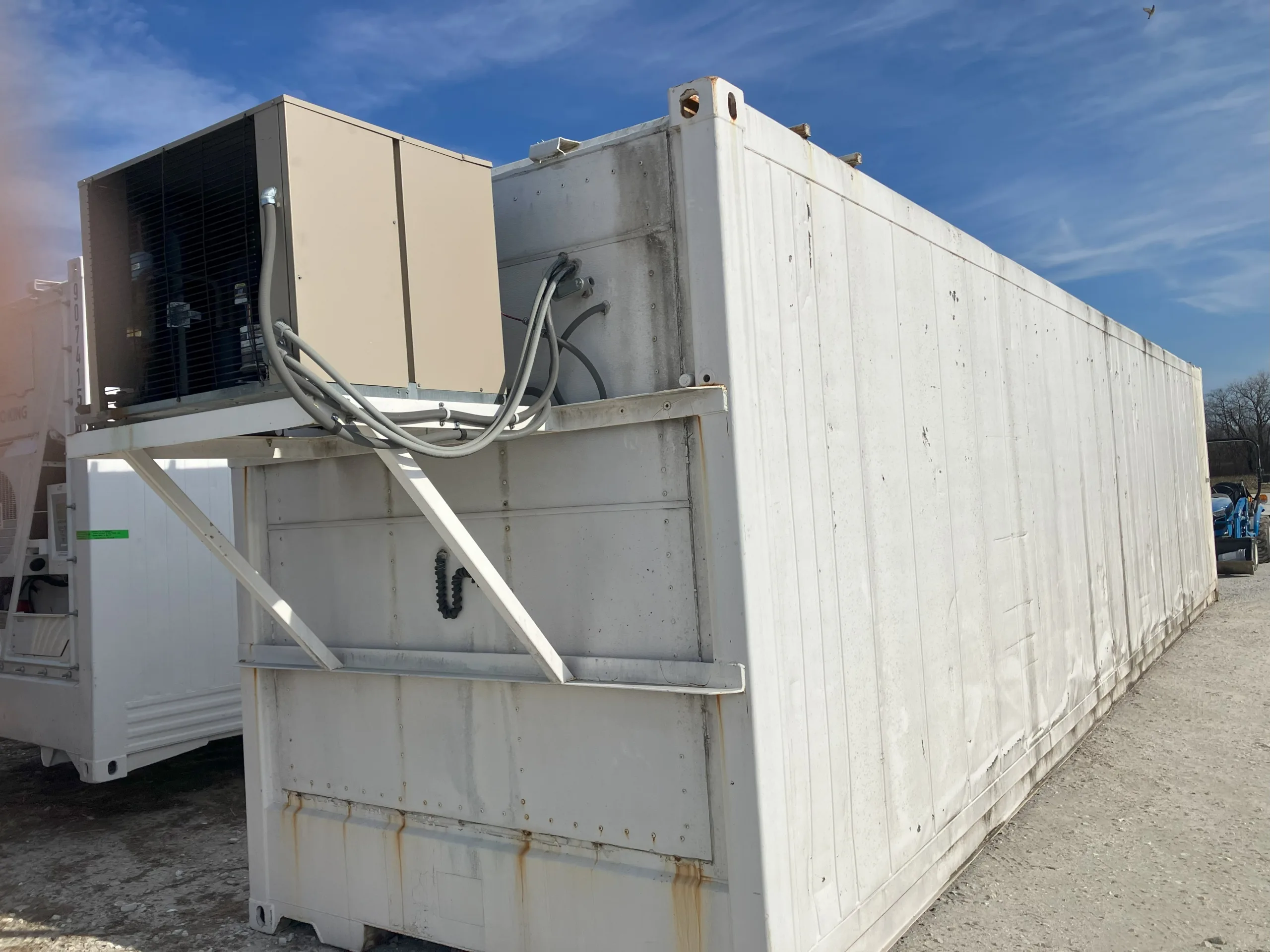 A reefer being affixed with Single-Phase Chillers and Freezers in Michigan